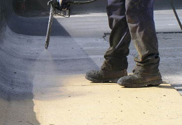 Coating systems over Allentown spray foam roof systems
